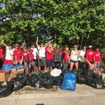 Swim club dives into Earth Day clean-up Swim club dives into Earth Day clean-up