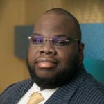 Caymanian financial advisor back at top event Caymanian financial advisor back at top event
