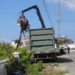RCIPS and DEH help clean up Watler’s Road RCIPS and DEH help clean up Watler’s Road