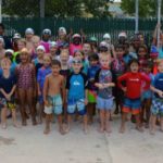 Young swimmers have fun in the sun Young swimmers have fun in the sun
